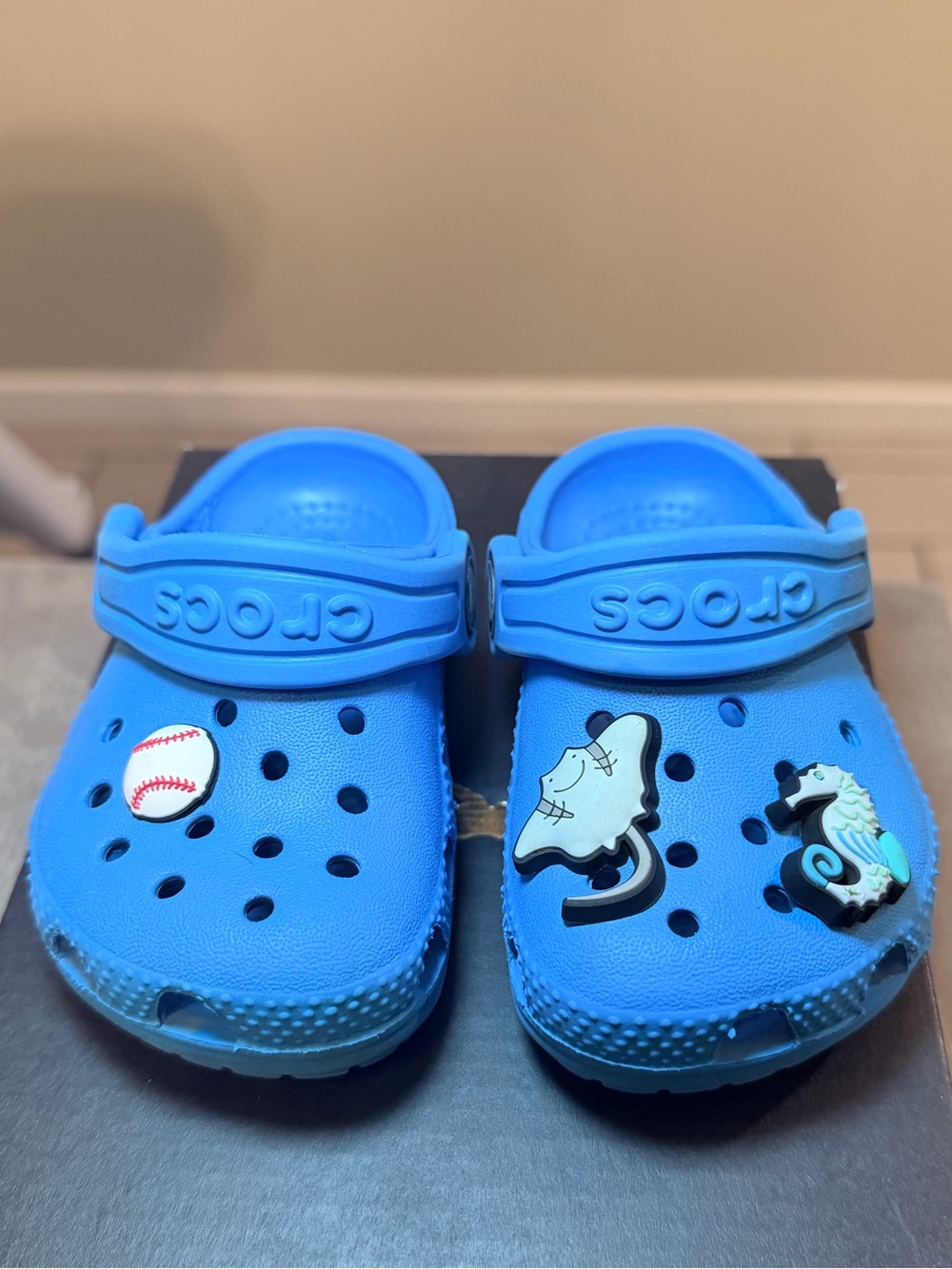 CROCS Kids Light Blue Clog with Sports & Sea Charms size 4.